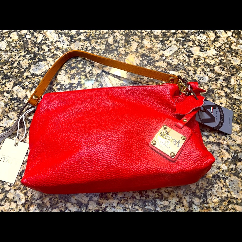 Brand new  tags  soft red leather clutch 3 compartments with inner zipper spots